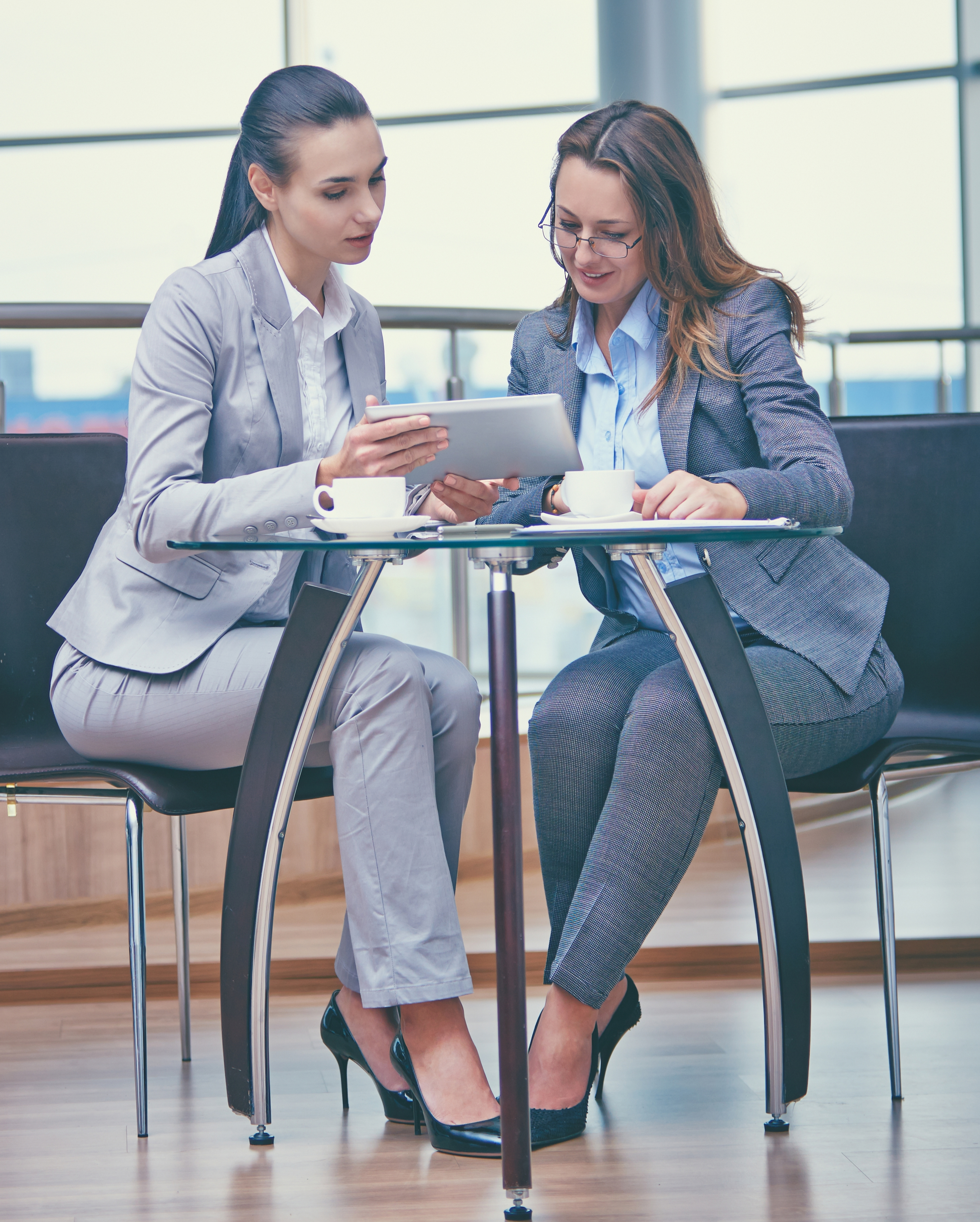 smart-businesswomen-working-with-tablet